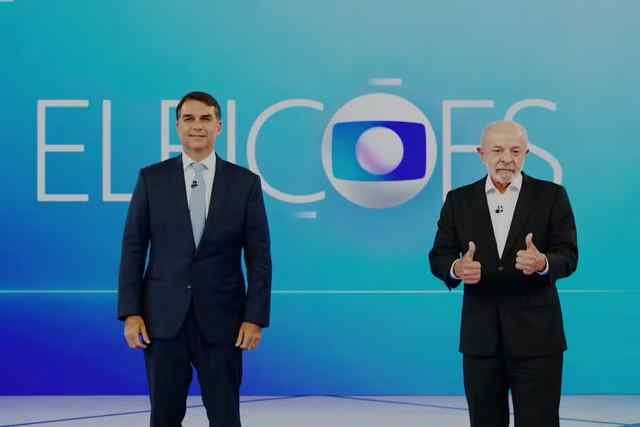 Lula e Flávio Bolsonaro no debate presidencial da TV Globo
